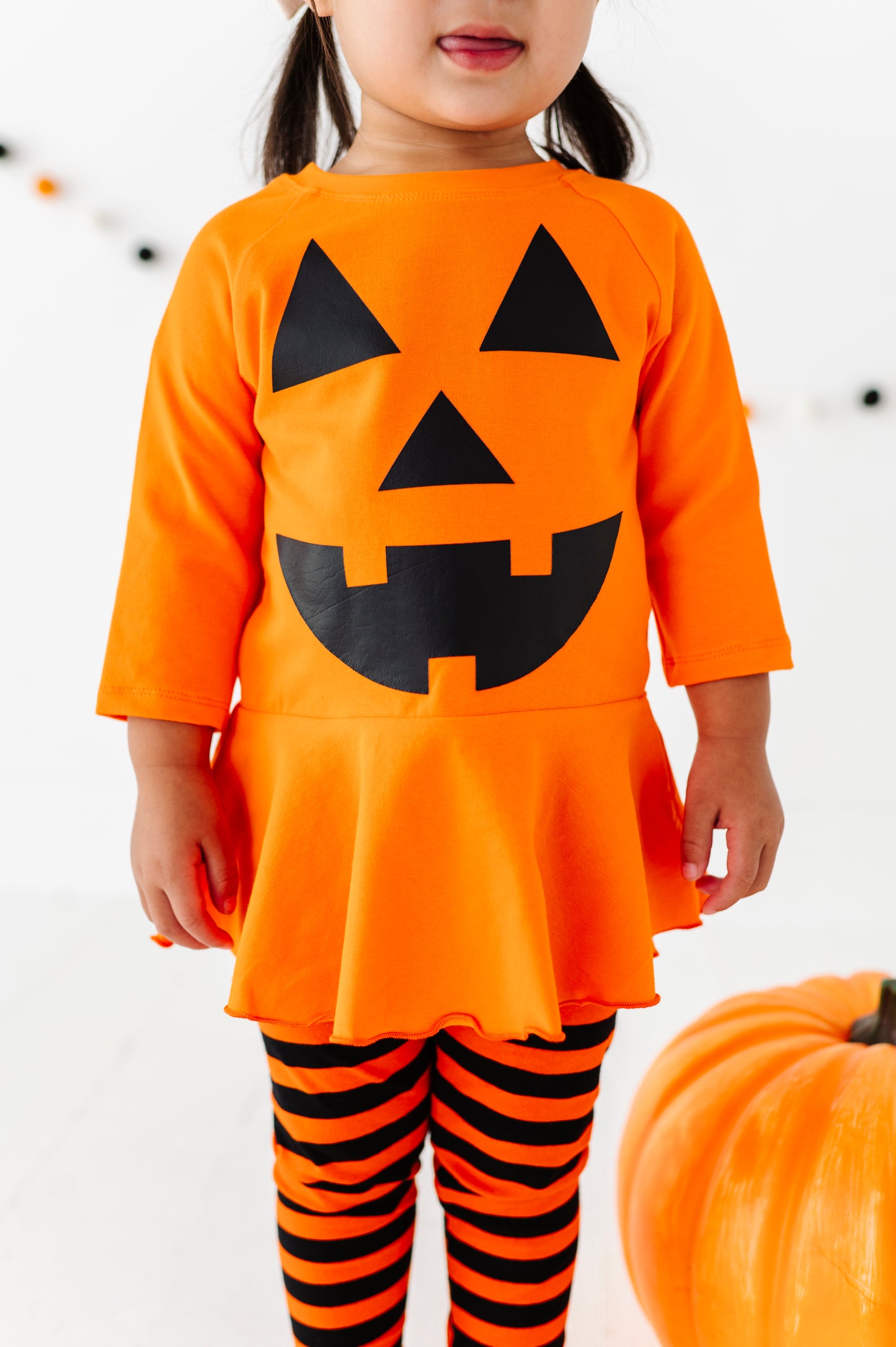 Emily Peplum- Jack o lantern